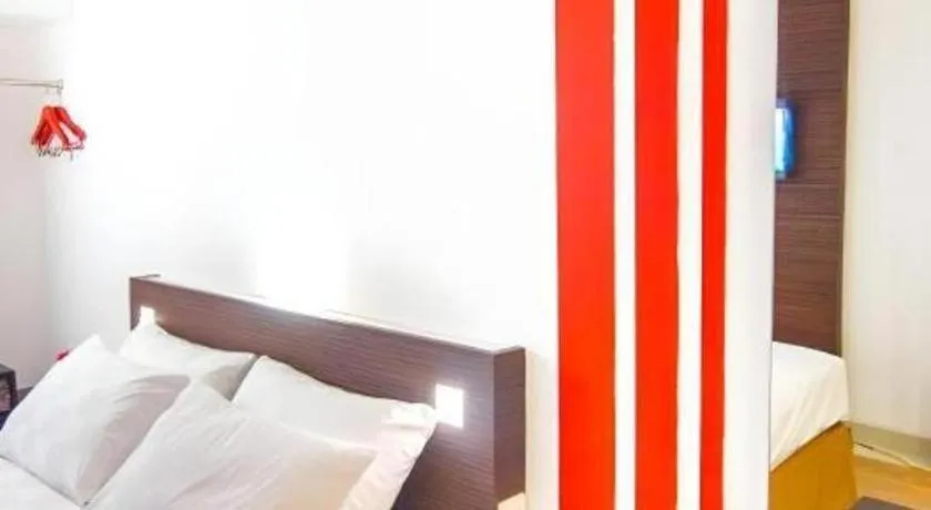 Bed in Redstar Hotel Jakarta