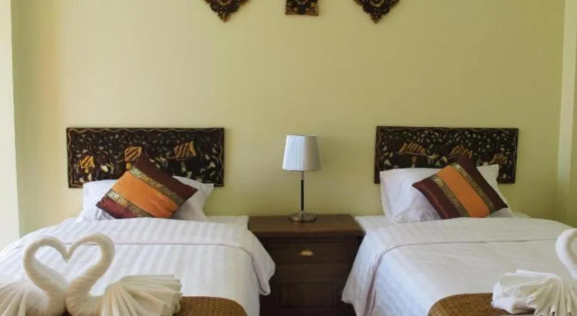 Bed in Baan Maesot Boutique Resort