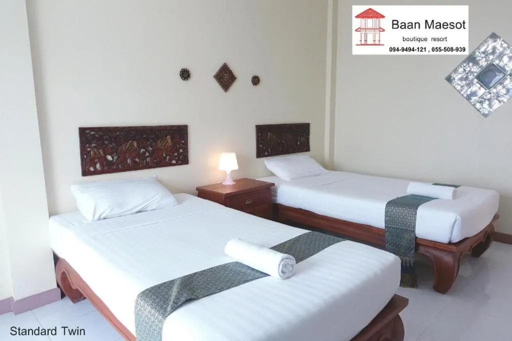 Bed in Baan Maesot Boutique Resort
