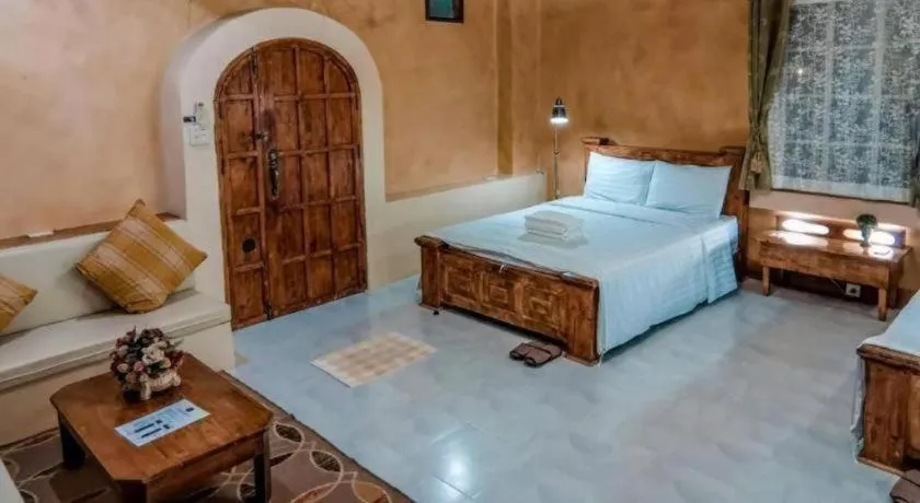 Bed in Villa Tuscany Country Resort