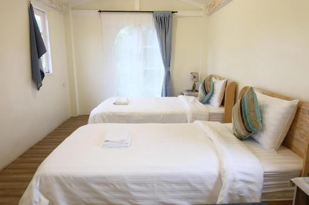 Bed in Villa Tuscany Country Resort