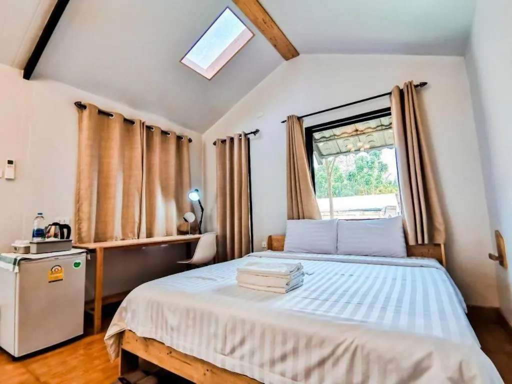 Bed in Villa Tuscany Country Resort