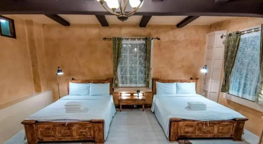 Bed in Villa Tuscany Country Resort