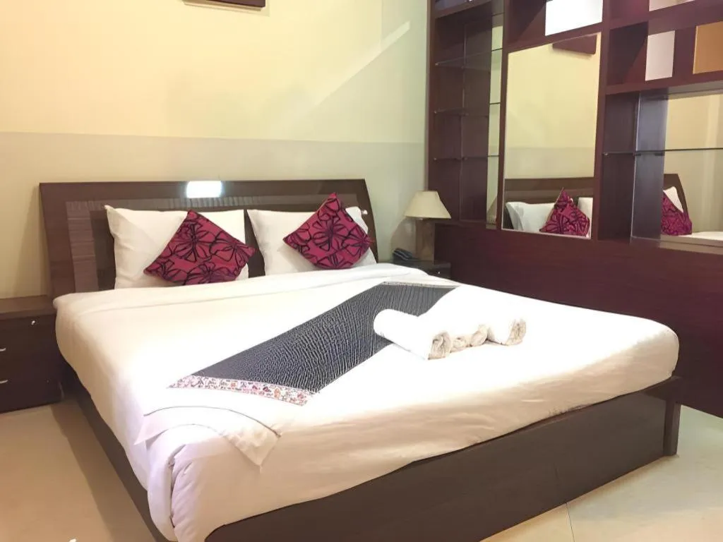 Bed in New Rose Boutique Hotel