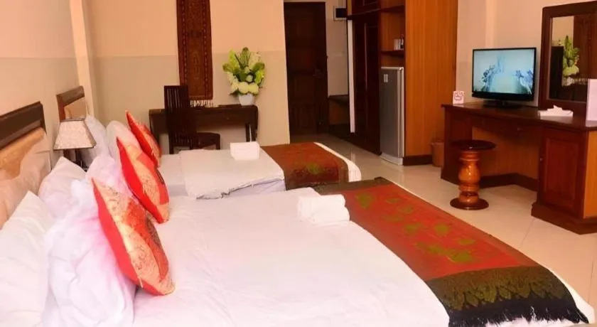 Bed in New Rose Boutique Hotel