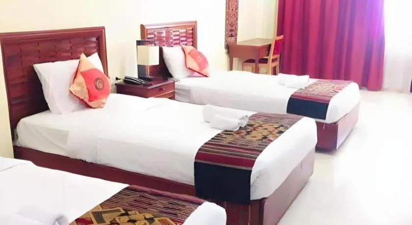 Bed in New Rose Boutique Hotel