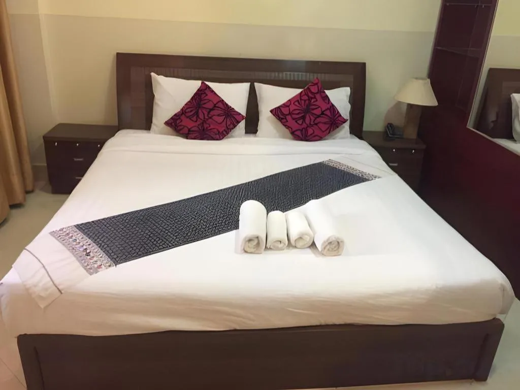 Bed in New Rose Boutique Hotel