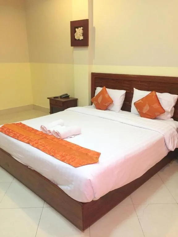 Bed in New Rose Boutique Hotel