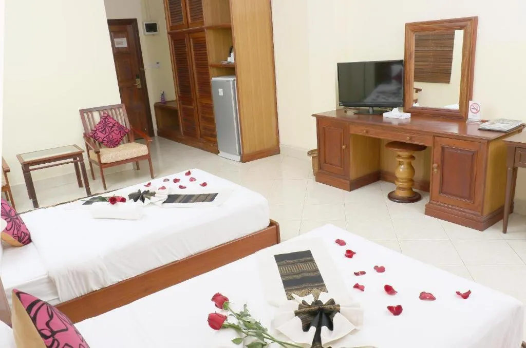 Bed in New Rose Boutique Hotel