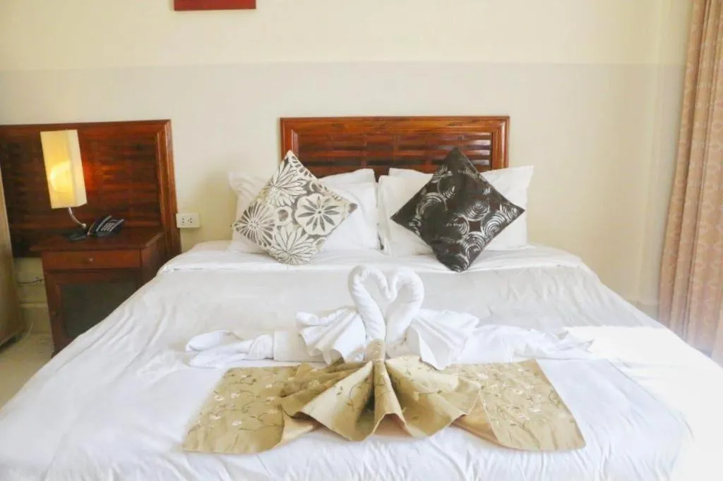 Bed in New Rose Boutique Hotel