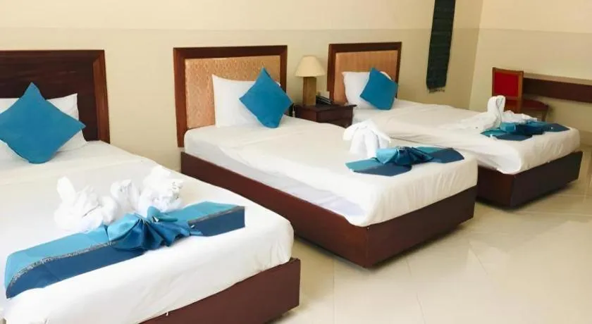 Bed in New Rose Boutique Hotel