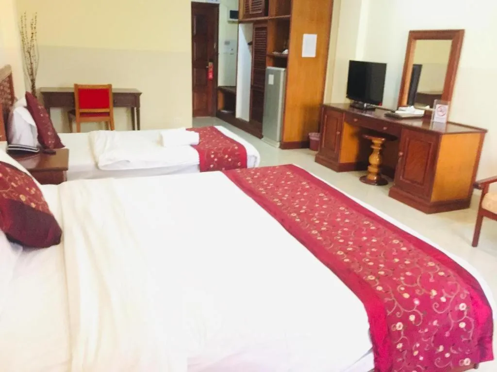 Bed in New Rose Boutique Hotel