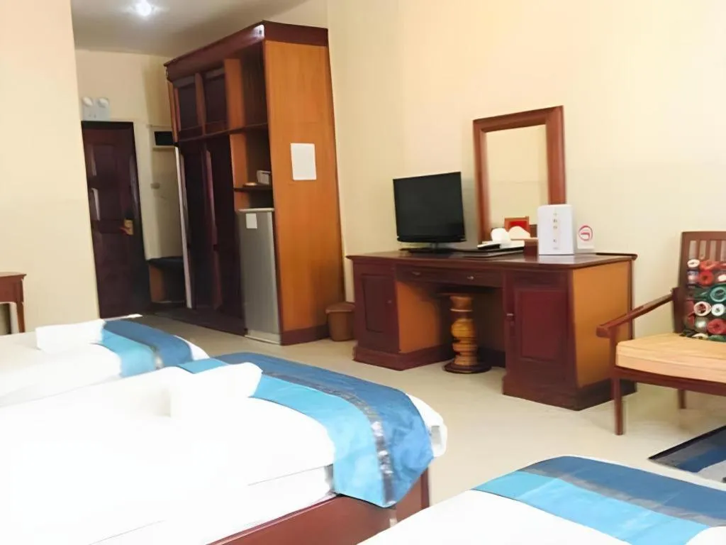 Bed in New Rose Boutique Hotel