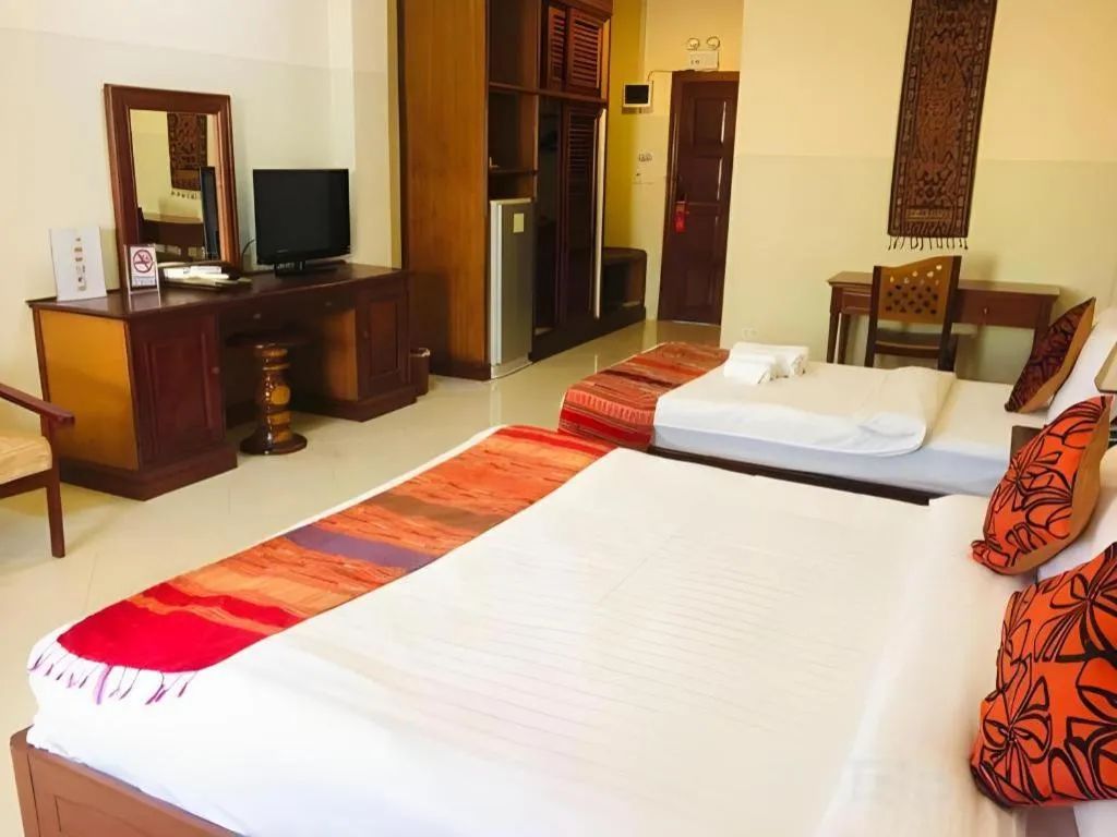 Bed in New Rose Boutique Hotel