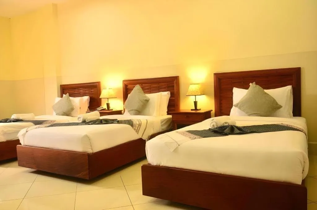 Bed in New Rose Boutique Hotel