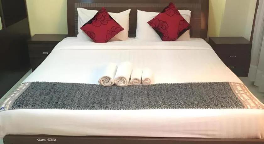 Bed in New Rose Boutique Hotel