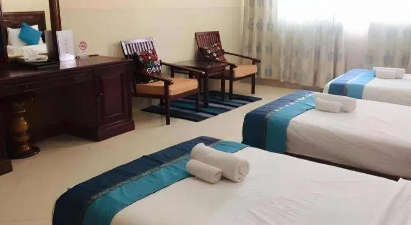 Bed in New Rose Boutique Hotel