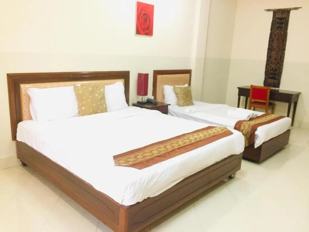 Bed in New Rose Boutique Hotel