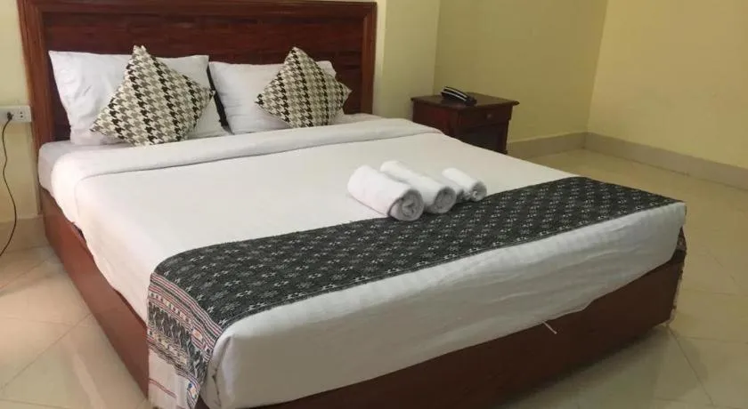 Bed in New Rose Boutique Hotel