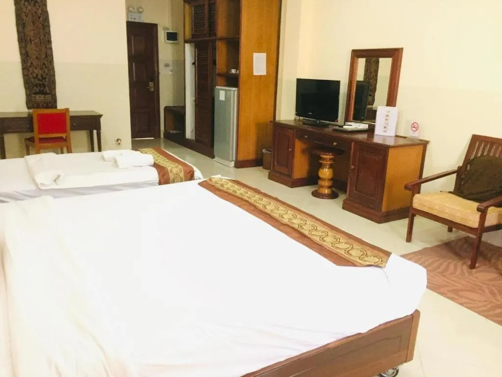 Bed in New Rose Boutique Hotel