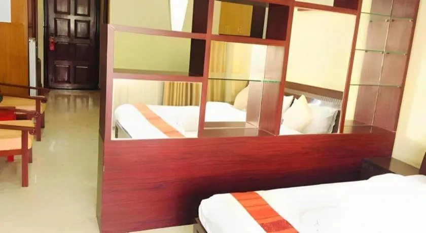 Bed in New Rose Boutique Hotel