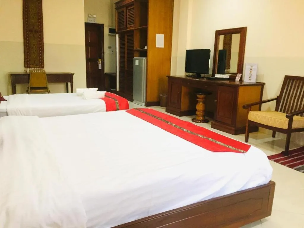 Bed in New Rose Boutique Hotel