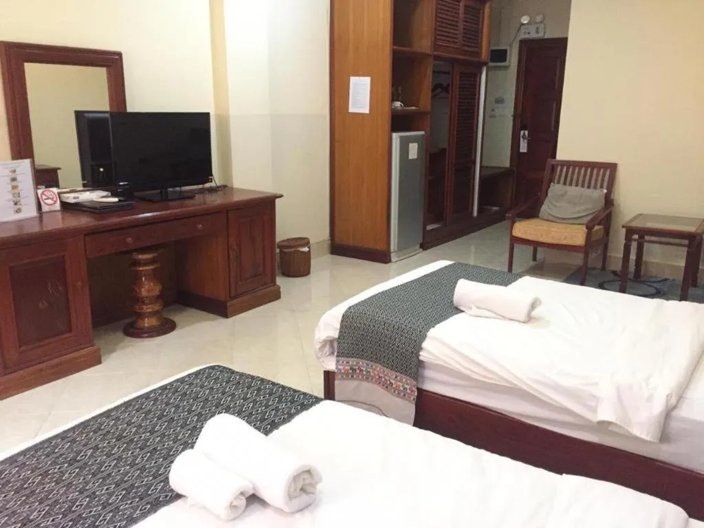 Bed in New Rose Boutique Hotel