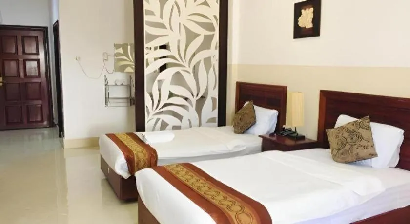 Bed in New Rose Boutique Hotel