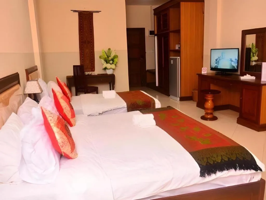 Bed in New Rose Boutique Hotel