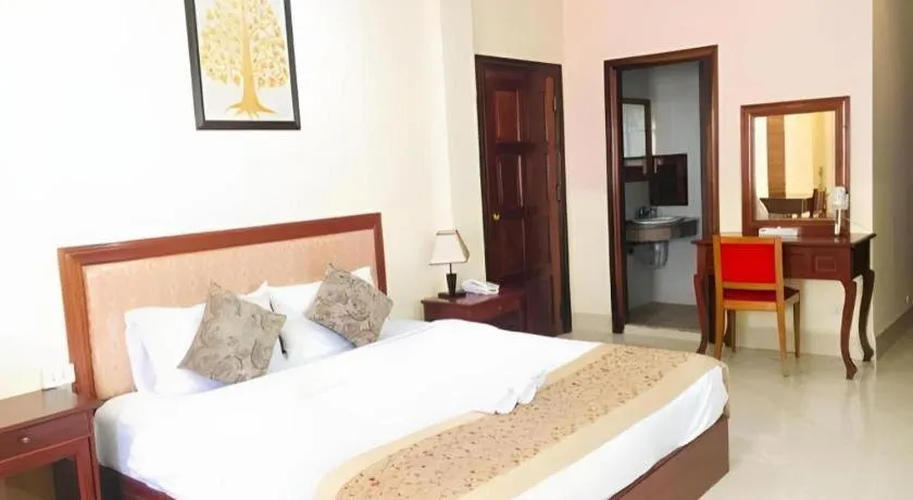 Bed in New Rose Boutique Hotel