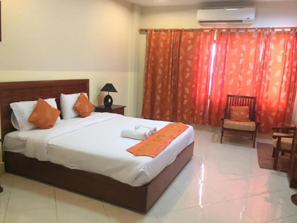 Bed in New Rose Boutique Hotel