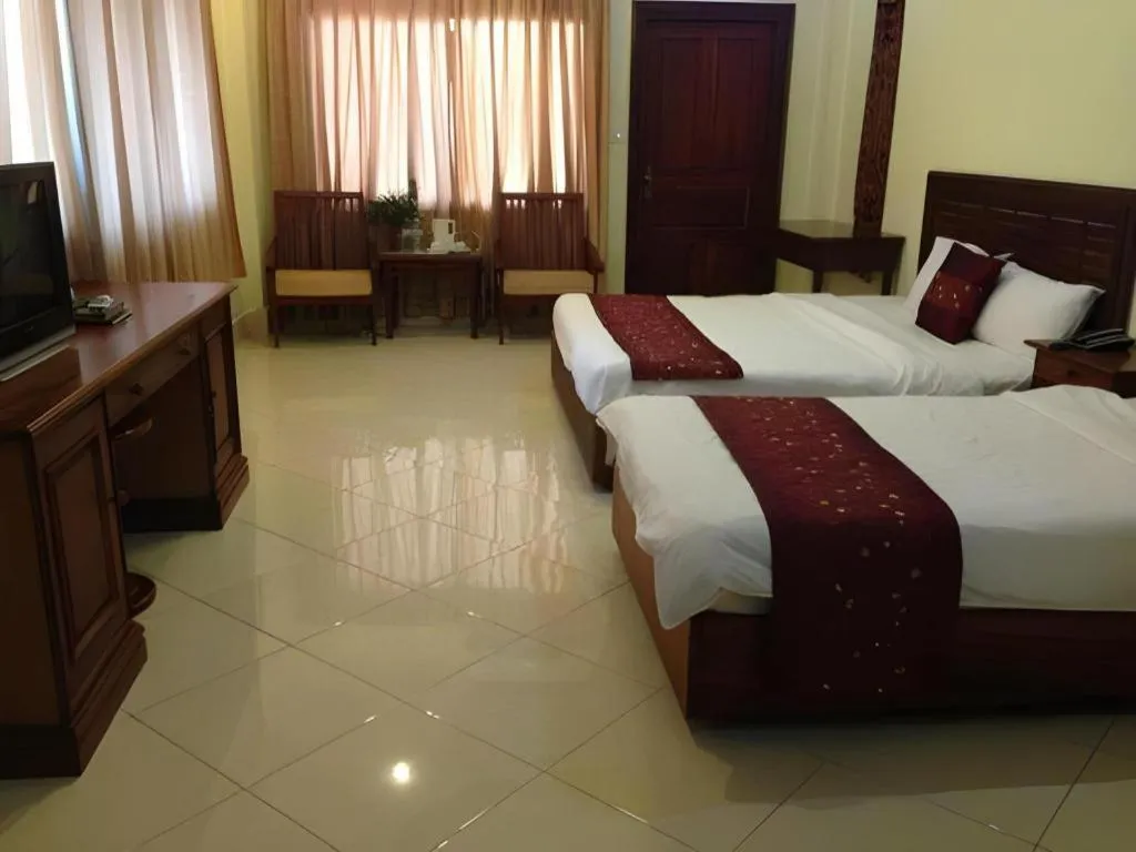 Bed in New Rose Boutique Hotel