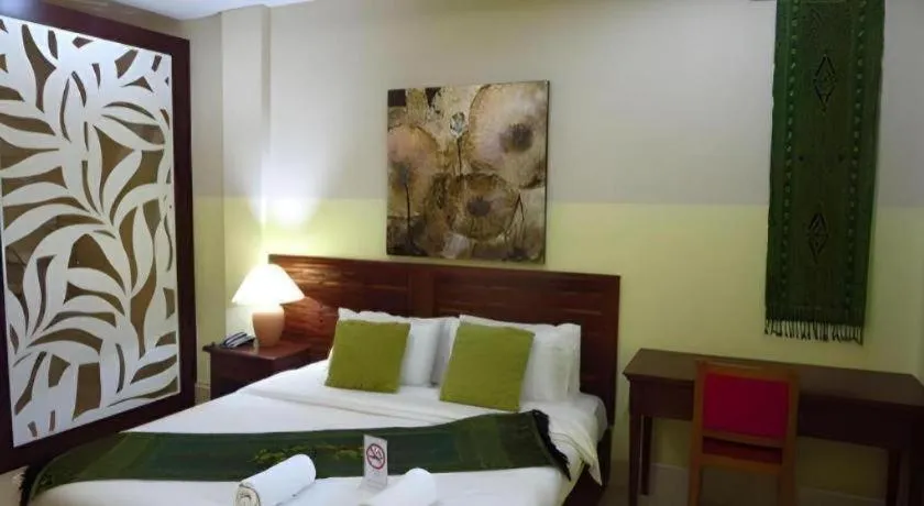 Bed in New Rose Boutique Hotel