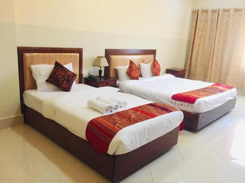 Bed in New Rose Boutique Hotel