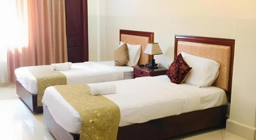 Bed in New Rose Boutique Hotel