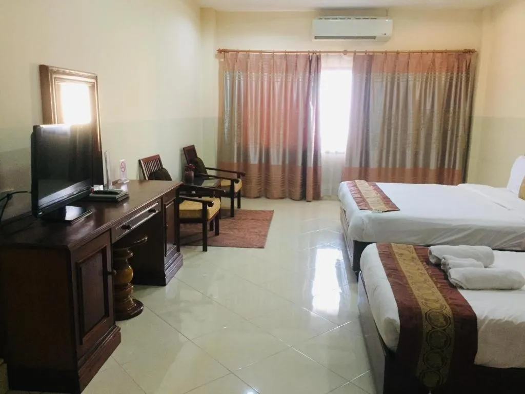 Bed in New Rose Boutique Hotel