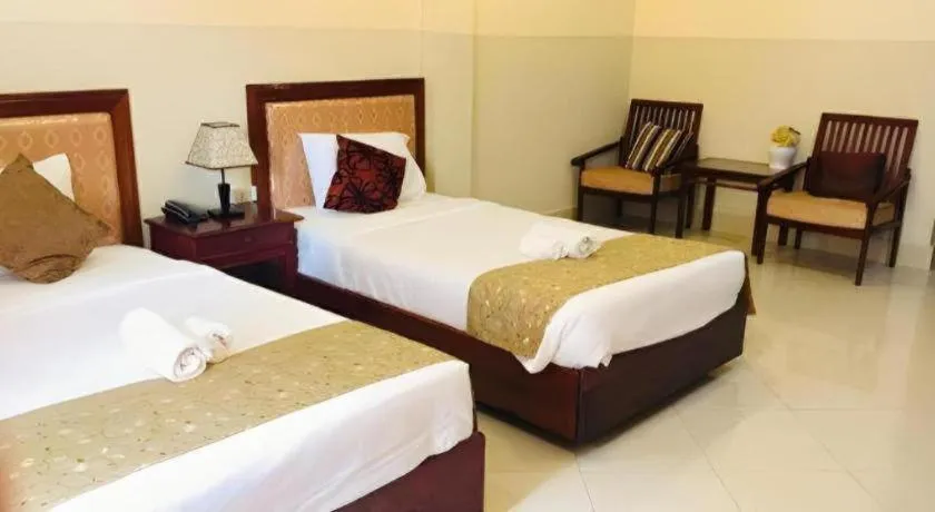 Bed in New Rose Boutique Hotel