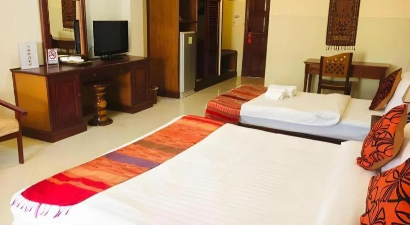 Bed in New Rose Boutique Hotel