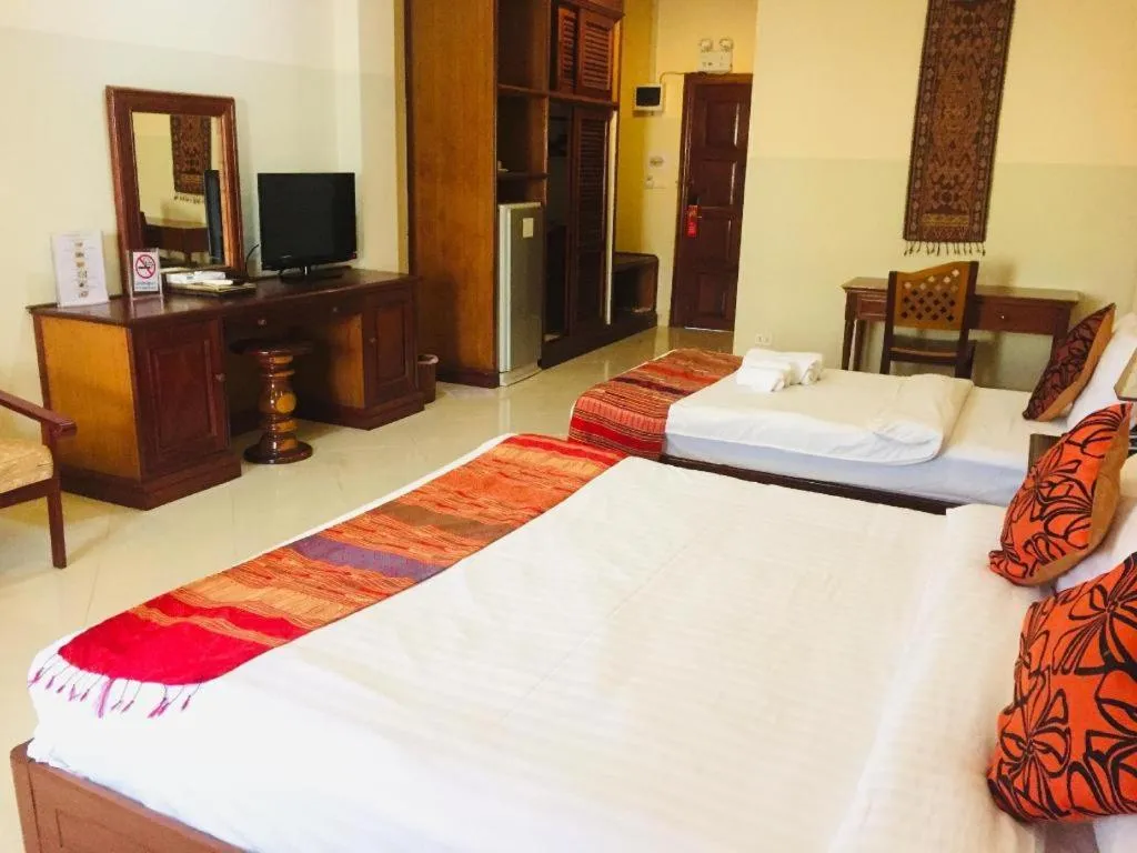 Bed in New Rose Boutique Hotel