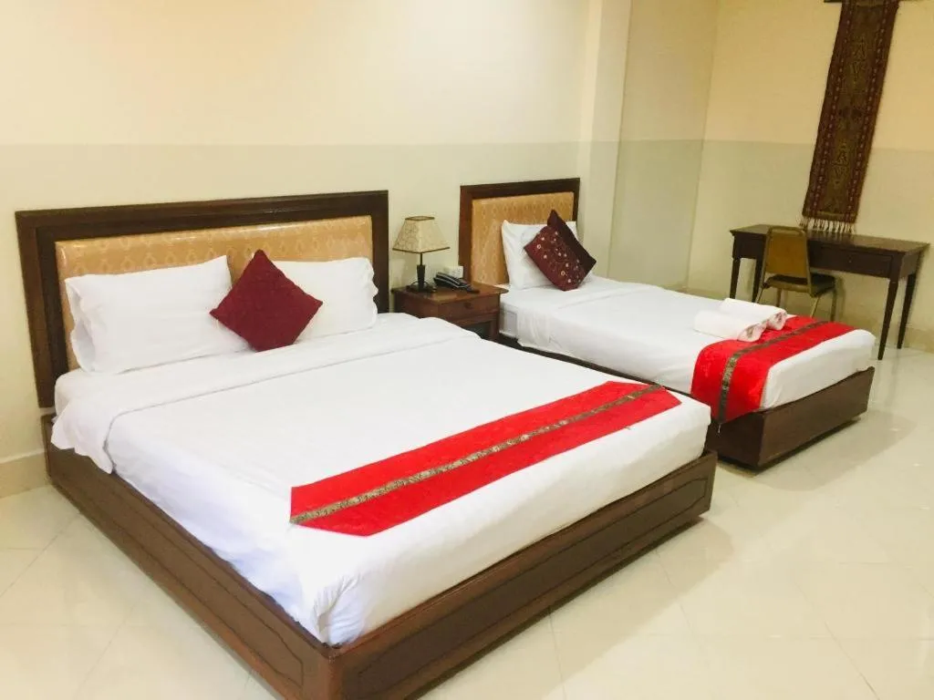Bed in New Rose Boutique Hotel