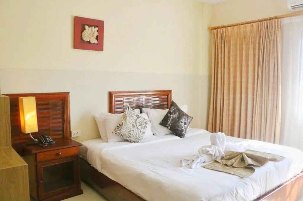 Bed in New Rose Boutique Hotel