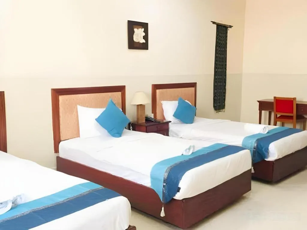 Bed in New Rose Boutique Hotel