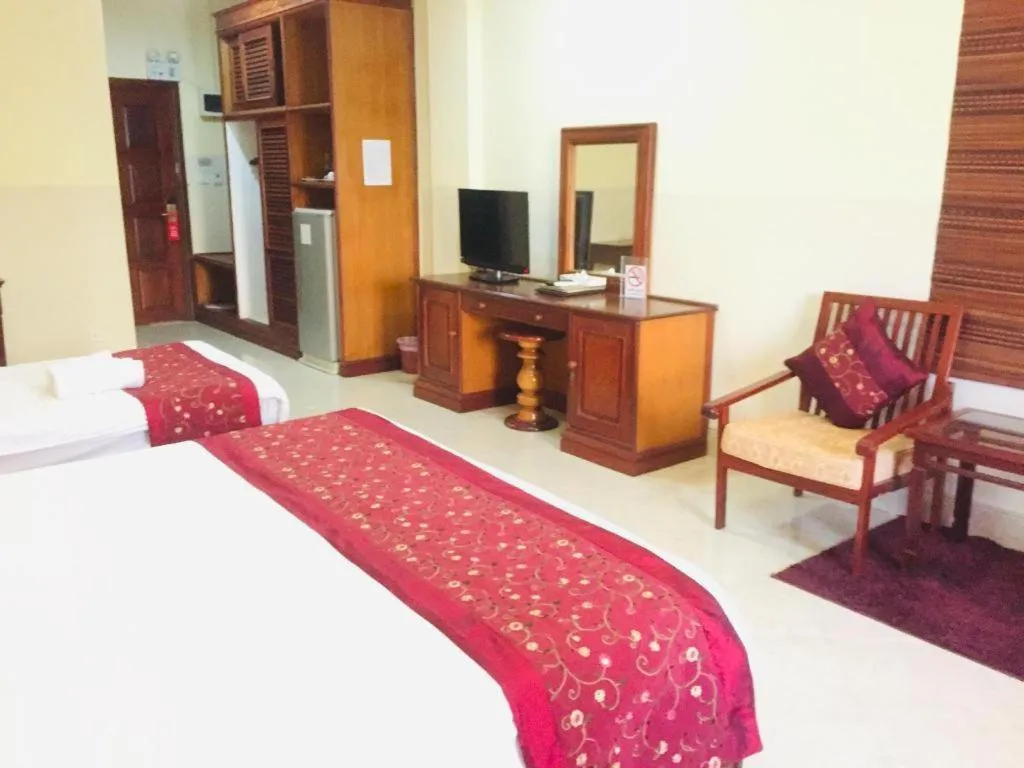 Bed in New Rose Boutique Hotel