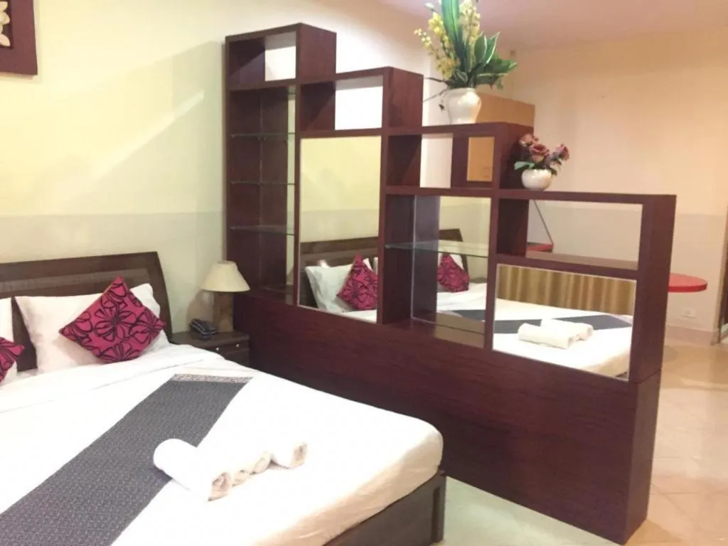 Bed in New Rose Boutique Hotel