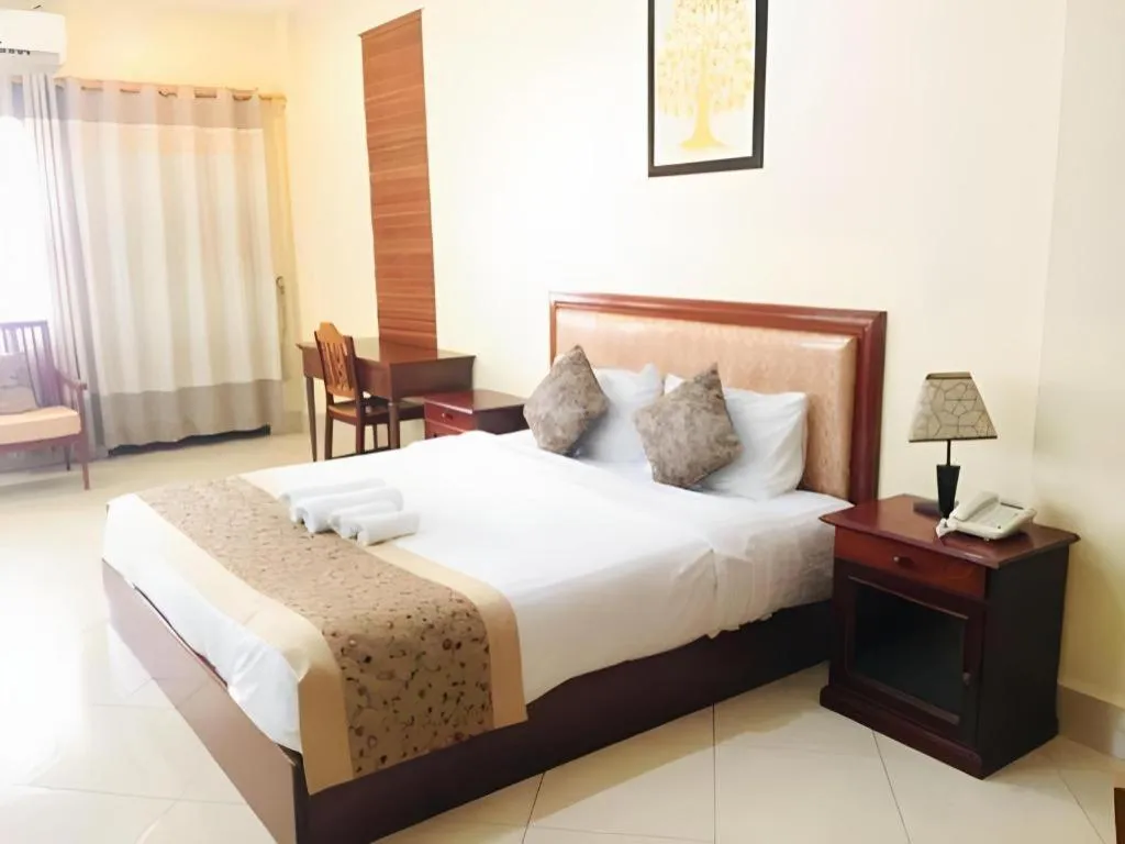 Bed in New Rose Boutique Hotel