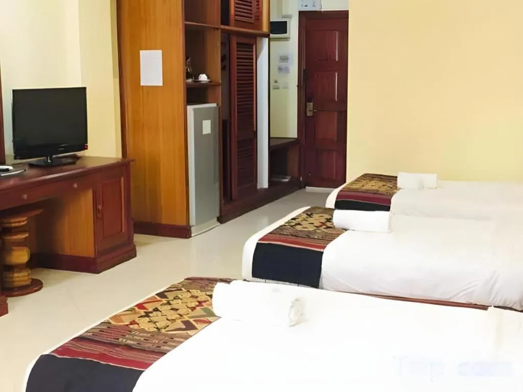 Bed in New Rose Boutique Hotel