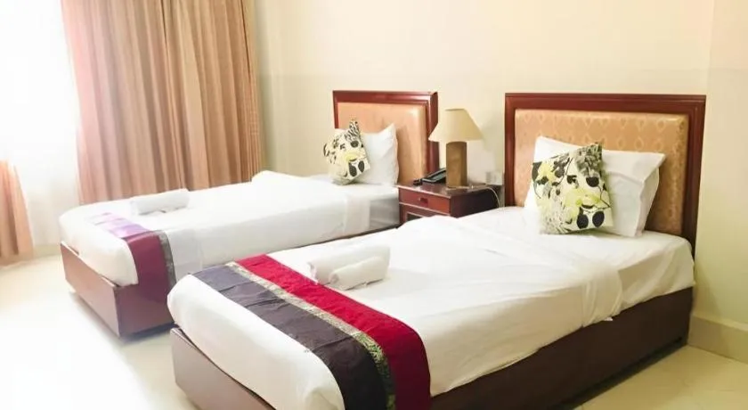 Bed in New Rose Boutique Hotel