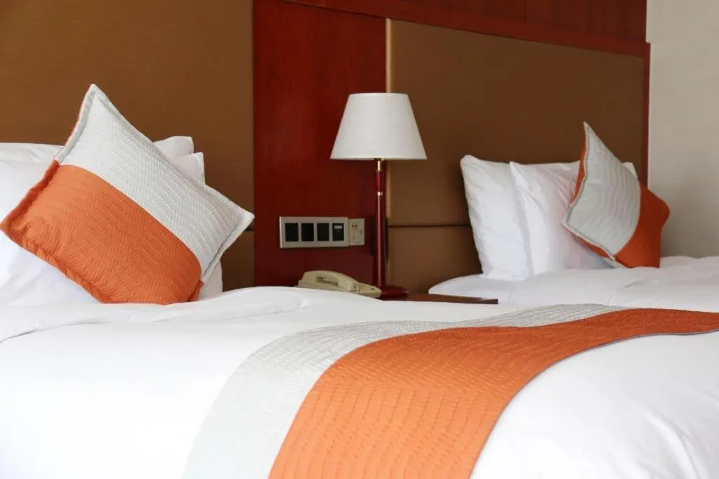 Bed in Xian Qujiang Yinzuo Hotel