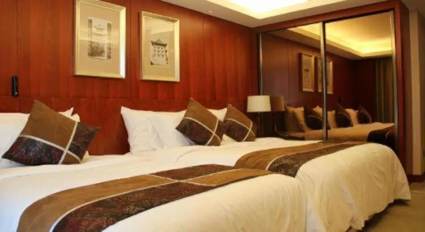 Bed in Xian Qujiang Yinzuo Hotel