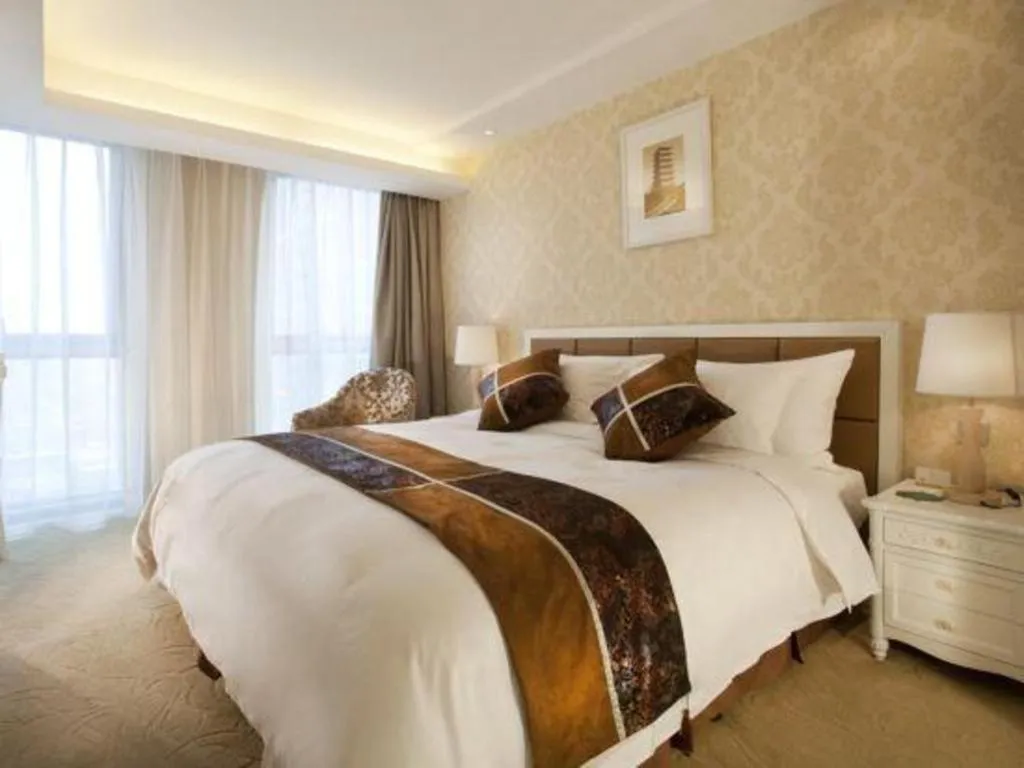 Bed in Xian Qujiang Yinzuo Hotel